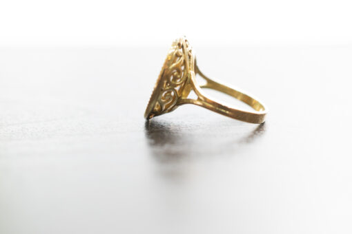 Bague pièce en or 18 carats