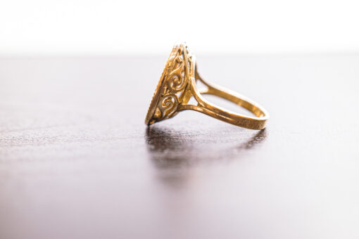 Bague pièce en or 18 carats